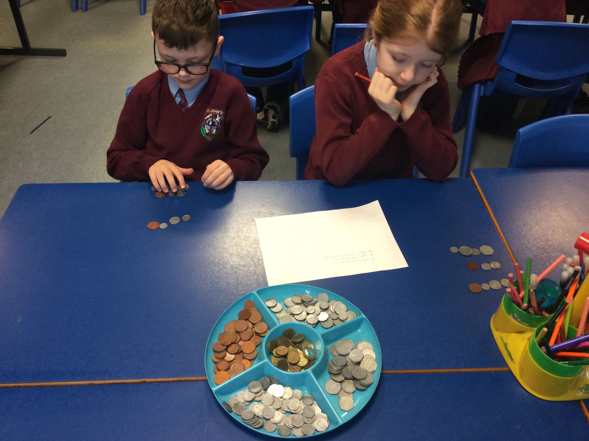 Year 4 making totals and buying items with money.