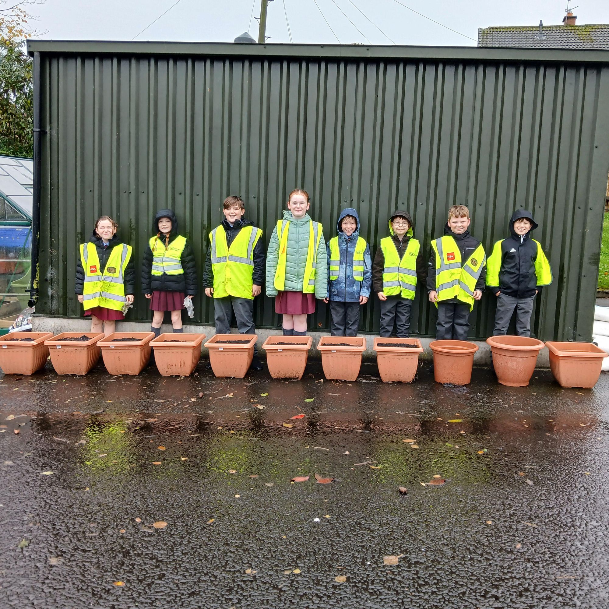 ECO Committee plant some spring bulbs and complete a litter survey.