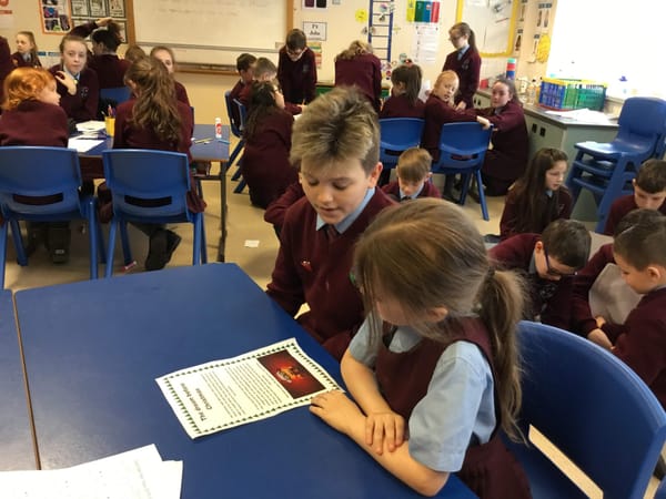 Mrs R Doherty's 7B class reading their stories to Miss Murphy's class on Friday