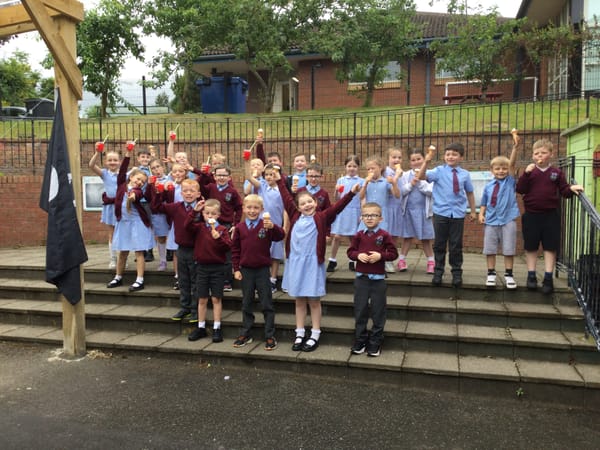 Year 3 enjoying a surprise visit from the ice cream van