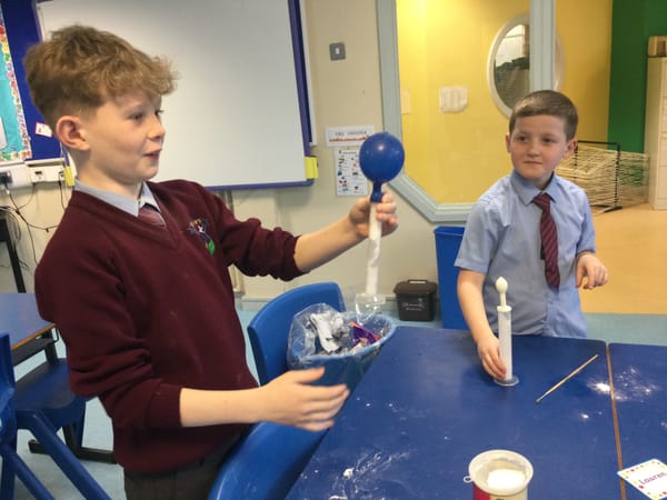Year 6 having fun making carbon dioxide.