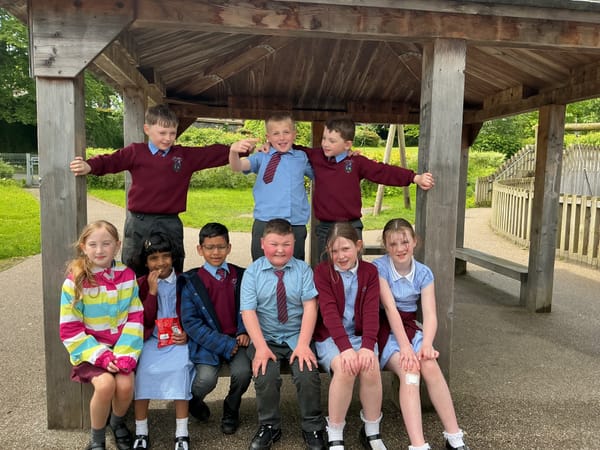 Nurture Children celebrate learning success.